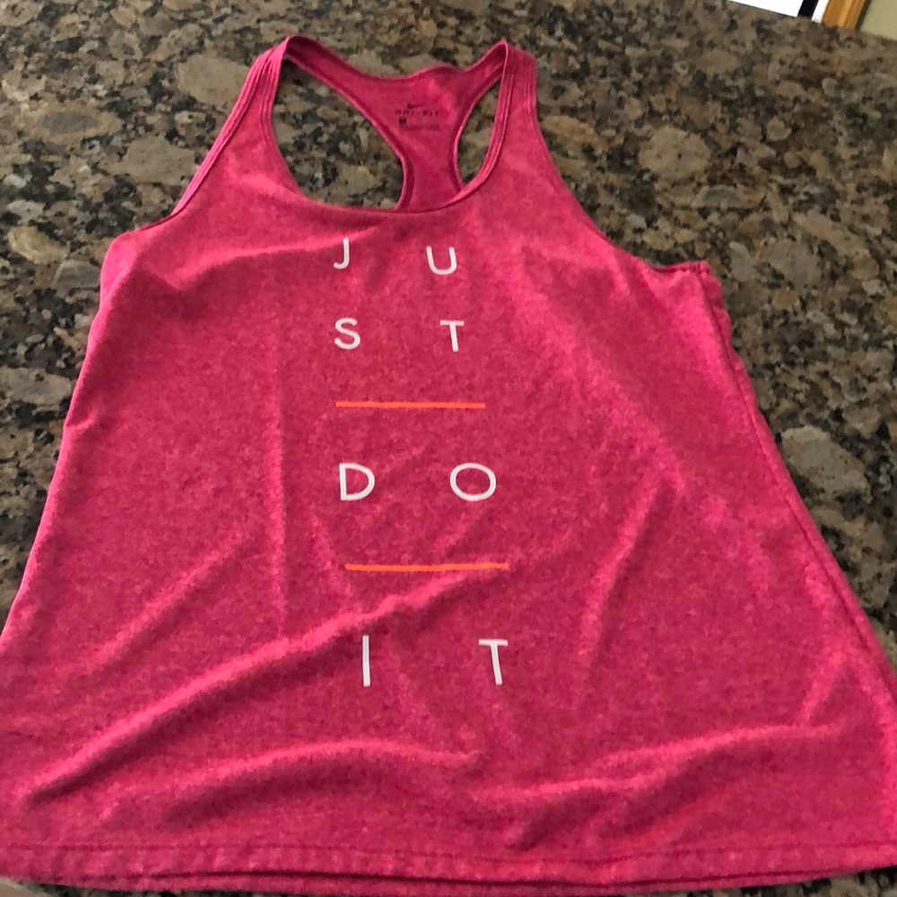 Woman’s pink Nike tank